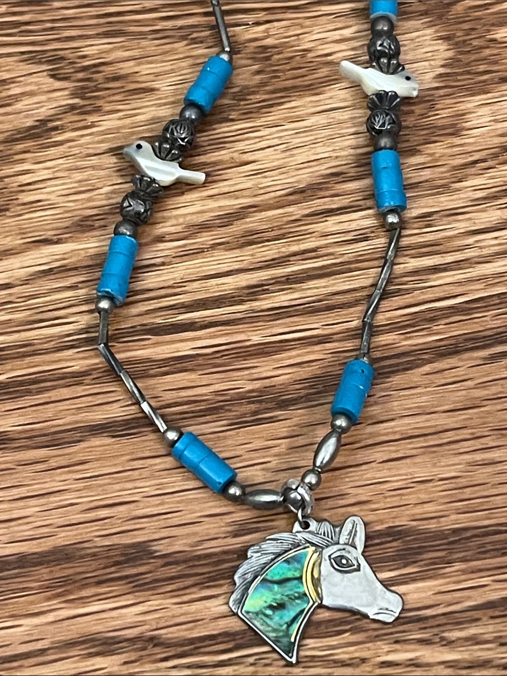 vintage Southwest-style necklace with horse pendant